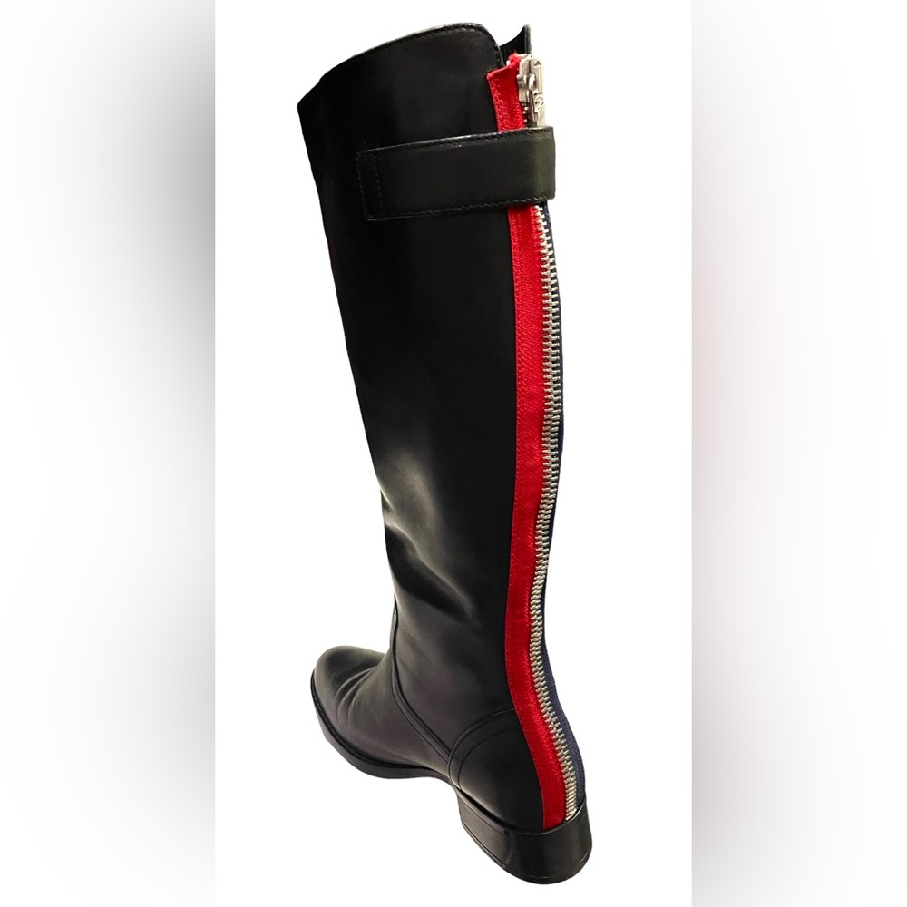 Steve Madden black boots, blue and red stripe zipper in back. Size 6, fit a 5.5